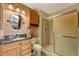 Bathroom with shower and updated vanity at 2134 S Scranton Way, Aurora, CO 80014