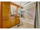 Bathroom with tub, shower, and updated vanity at 2134 S Scranton Way, Aurora, CO 80014