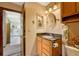 Bathroom with vanity and kitchen view at 2134 S Scranton Way, Aurora, CO 80014