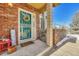 Inviting front entrance with teal door, wreath, and welcome mat at 2134 S Scranton Way, Aurora, CO 80014