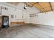 Spacious garage with ample storage cabinets and shelving at 2134 S Scranton Way, Aurora, CO 80014