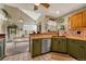 Open concept kitchen with island and stainless steel appliances at 2134 S Scranton Way, Aurora, CO 80014