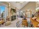 Vaulted ceiling living room with fireplace and access to back patio at 2134 S Scranton Way, Aurora, CO 80014