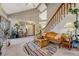 Living room with vaulted ceiling, fireplace, and ample natural light at 2134 S Scranton Way, Aurora, CO 80014