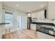 Bright kitchen featuring stainless steel appliances, breakfast bar and an open layout at 715 W 7Th Ave, Denver, CO 80204