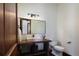 Unique bathroom with stone sink, wooden vanity and wood trim at 9833 Shoreline Dr, Longmont, CO 80504