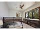 Bedroom with bunk beds, dresser, and a large window with views at 9833 Shoreline Dr, Longmont, CO 80504