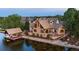 Gorgeous waterfront home with private dock, boat lift, and outdoor entertaining space at 9833 Shoreline Dr, Longmont, CO 80504