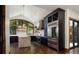 Modern kitchen with stainless steel appliances, marble counters, and ample storage space at 9833 Shoreline Dr, Longmont, CO 80504