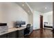 Office features built-in desk, storage, and hardwood flooring at 9833 Shoreline Dr, Longmont, CO 80504
