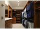 Walk-in closet with built-in drawers, shelves, and racks at 9833 Shoreline Dr, Longmont, CO 80504