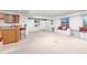 Spacious basement recreation room with built-in workspace and bar at 5123 Red Oak Way, Parker, CO 80134