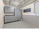 Basement storage room with gray cabinets and pegboard at 5123 Red Oak Way, Parker, CO 80134