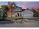 Two-story house with attached garage and landscaping at 5123 Red Oak Way, Parker, CO 80134