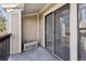 Private balcony with sliding door access and AC unit at 8678 Decatur St # 288, Westminster, CO 80031