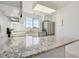 Modern kitchen with granite countertops and stainless steel appliances at 8678 Decatur St # 288, Westminster, CO 80031