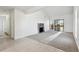 Living room with vaulted ceiling, fireplace and sliding glass door to balcony at 8678 Decatur St # 288, Westminster, CO 80031