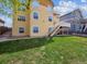 A well maintained home with a spacious yard featuring a two-level deck and stairs leading down to the grass at 3309 Springbriar Dr, Castle Rock, CO 80109
