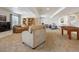 Finished basement features plush seating, built-in shelving, and recreational space for entertainment and relaxation at 3309 Springbriar Dr, Castle Rock, CO 80109