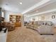 Spacious finished basement featuring a comfortable seating area and additional space for various activities at 3309 Springbriar Dr, Castle Rock, CO 80109