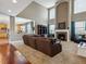 Spacious living room features a fireplace, plush carpet, and lots of natural light at 3309 Springbriar Dr, Castle Rock, CO 80109