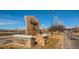 A stone welcome sign marks the entrance to Legacy Ridge Golf Course at Westminster with mature landscaping at 3462 W 109Th Cir, Westminster, CO 80031