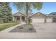 Beautiful single-Gathering home featuring a manicured lawn and a three-car garage at 3462 W 109Th Cir, Westminster, CO 80031