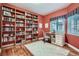 Cozy office with built-in bookshelves and a bright window, perfect for working from home at 3462 W 109Th Cir, Westminster, CO 80031