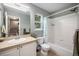 Clean bathroom with a shower/tub combo, toilet and vanity at 4700 Waldenwood Dr, Highlands Ranch, CO 80130