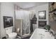 Main bathroom with shower, bathtub, and modern decor at 4700 Waldenwood Dr, Highlands Ranch, CO 80130