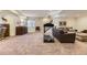 Finished basement area with carpeted floors, workout space, and a comfortable seating area at 3477 New Haven Cir, Castle Rock, CO 80109