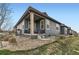 Beautiful home exterior with blue siding and a charming patio at 3477 New Haven Cir, Castle Rock, CO 80109