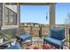 Outdoor patio area with comfortable seating and a view of the surrounding community at 3477 New Haven Cir, Castle Rock, CO 80109