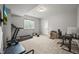 Finished basement with a carpet floor, a treadmill, workout machines, and a television for exercise and entertainment at 16312 Morning Rise Ln, Monument, CO 80132