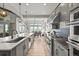 Well-appointed kitchen with an expansive countertop, stainless steel appliances, and scenic outdoor views at 16312 Morning Rise Ln, Monument, CO 80132