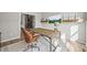 Comfortable home office with stylish decor, hardwood floors, modern lighting, and open floor plan at 16312 Morning Rise Ln, Monument, CO 80132