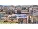Scenic view of the community pool, surrounded by well-maintained landscaping and residential buildings at 3866 S Dallas Cir # 201, Aurora, CO 80014