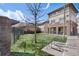 Well-kept green space adjacent to the apartments in the community with bike racks at 3866 S Dallas Cir # 201, Aurora, CO 80014