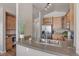 Bright kitchen with stainless steel appliances, granite countertops, and wood cabinets at 3866 S Dallas Cir # 201, Aurora, CO 80014