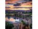 Stunning community pool with sunset views, perfect for relaxation and entertainment at 7746 S Valdai Ct, Aurora, CO 80016