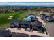 Aerial view of the neighborhood with well-maintained homes and green spaces at 16544 E 118Th Dr, Commerce City, CO 80022