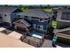 Beautiful two-story home with a fenced front yard and a two-car garage at 16544 E 118Th Dr, Commerce City, CO 80022