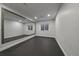 Basement gym featuring a large mirror, recessed lighting, and a rubber floor at 9443 Torrey Way, Arvada, CO 80007