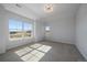 Bright bedroom featuring large windows with scenic outdoor views at 9443 Torrey Way, Arvada, CO 80007