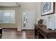 Welcoming foyer with hardwood floors and a entry table at 24351 E Alamo Dr, Aurora, CO 80016