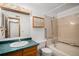 Well-maintained bathroom with a bathtub, tiled walls, and a classic vanity at 15350 E Arizona Ave # 106, Aurora, CO 80017