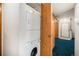 Convenient stackable washer and dryer, neatly tucked away in the hallway closet for easy access at 15350 E Arizona Ave # 106, Aurora, CO 80017