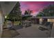 A spacious back deck with an outdoor dining set, perfect for entertaining guests outside at 1648 S Locust St, Denver, CO 80224