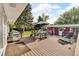 A spacious back deck with an outdoor dining set, perfect for entertaining guests outside at 1648 S Locust St, Denver, CO 80224