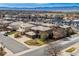 Beautiful aerial view of a residential neighborhood with stunning mountain views at 9109 Ironwood Way, Highlands Ranch, CO 80129